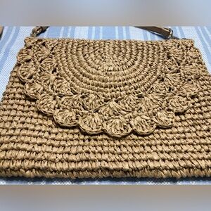 LC Lauren Conrad woven tan straw crossbody bag.